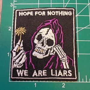 2/$10 We Are Liars Skeleton Patch with Purple Hood